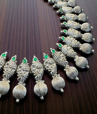 The Ajara Nakshi Silver Peacock Necklace & Earrings (Oxidised)