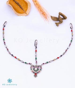 The Shubhi Navratna Silver Peacock Maang Tikka